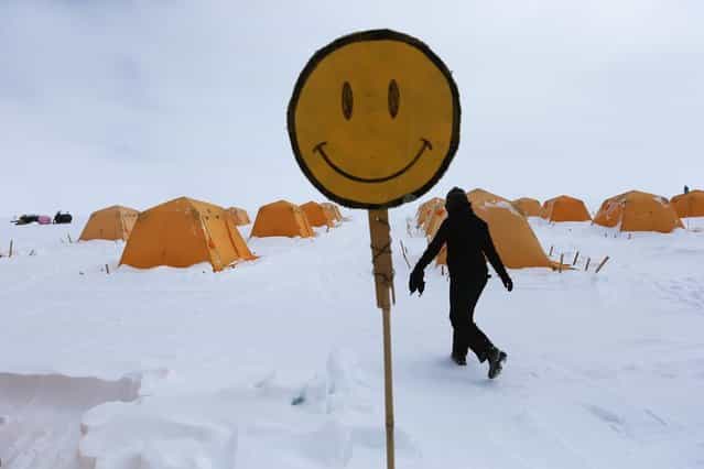 A happy face is seen near the tents where researchers live at Summit Station on July 11, 2013 on the Glacial Ice Sheet, Greenland. (Photo by Joe Raedle/Getty Images via The Atlantic)