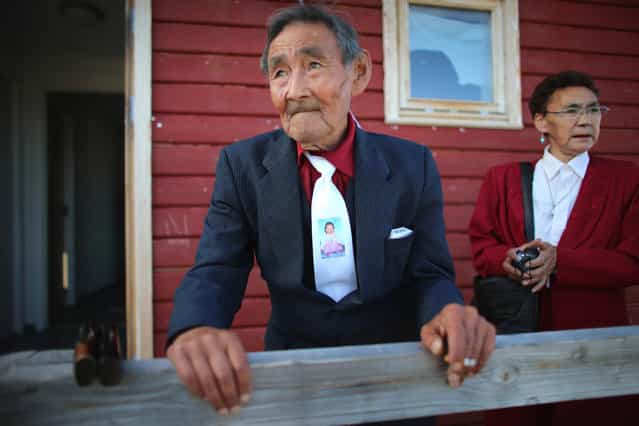 Inuk Lange attends the wedding party of his granddaughter Ottilie in Qeqertaq, on July 20, 2013. (Photo by Joe Raedle/Getty Images via The Atlantic)