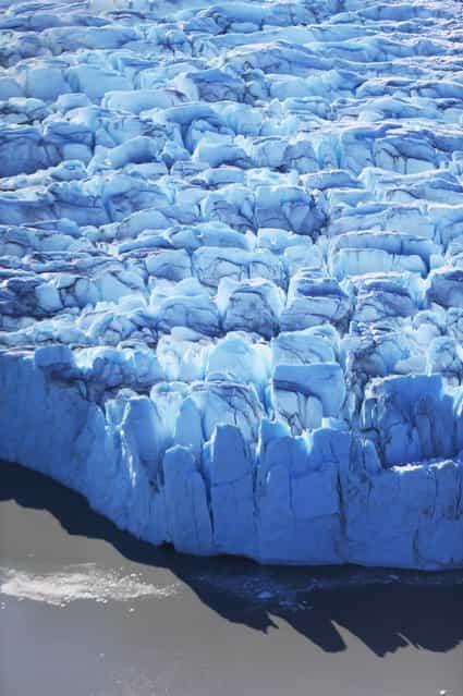 The surface of the glacier is seen on July 10, 2013 in Kangerlussuaq, Greenland. (Photo by Joe Raedle/Getty Images via The Atlantic)
