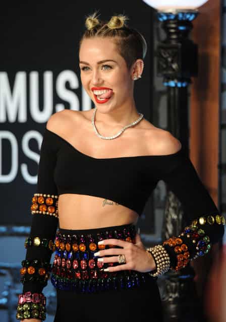 Miley Cyrus arrives at the MTV Video Music Awards on Sunday, August 25, 2013, at the Barclays Center in the Brooklyn borough of New York. (Photo by Evan Agostini/Invision/AP Photo)
