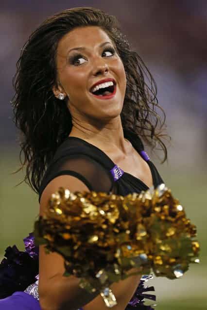 A Baltimore Ravens cheerleader entertains fans during a preseason game against the Carolina Panthers at M&T Bank Stadium. (Photo by Mitch Stringer/USA TODAY Sports)
