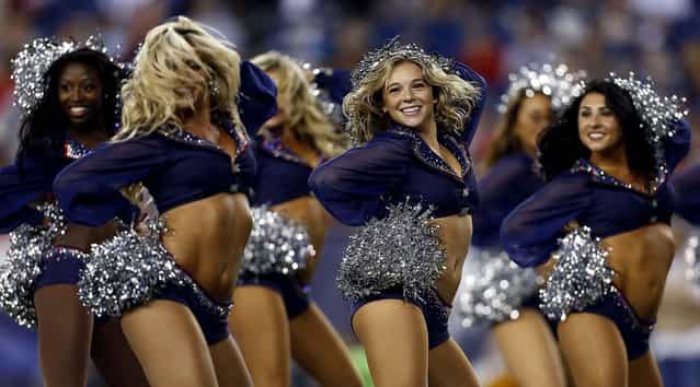 New England Patriots cheerleaders perform during a preseason game against the Tampa Bay Buccaneers in Foxborough. (Photo by Michael Dwyer/Associated Press)