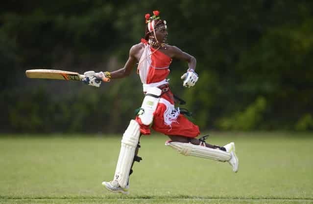 Papai Simon Ole Mamai of the Maasai Cricket Warriors team from Kenya runs during a match against English team [The Shed] during [The Last Man Stands] cricket tournament at Dulwich sports ground in South London September 1, 2013. (Photo by Philip Brown/Reuters)