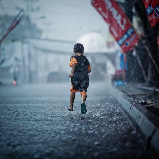 [The boy who leapt through rain]. (Photo by Rifat Attamimi)