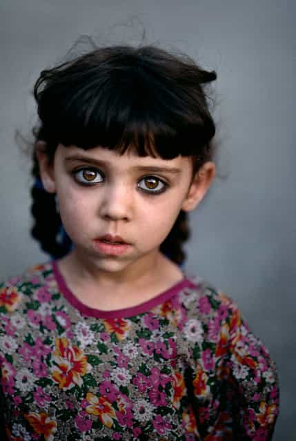 Girl in Kandahar orphanage, Afghanistan. (Photo by Steve McCurry)