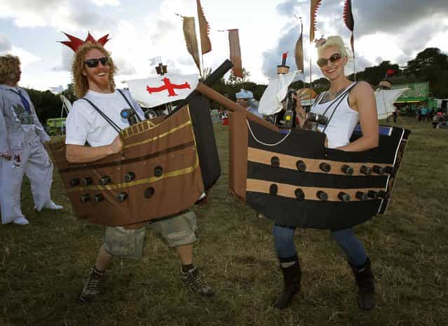 Festival goers in fancy dress at Bestival, held at Robin Hill Country Park on the Isle of Wight, on September 7, 2013. (Photo by Yui Mok/PA Wire)