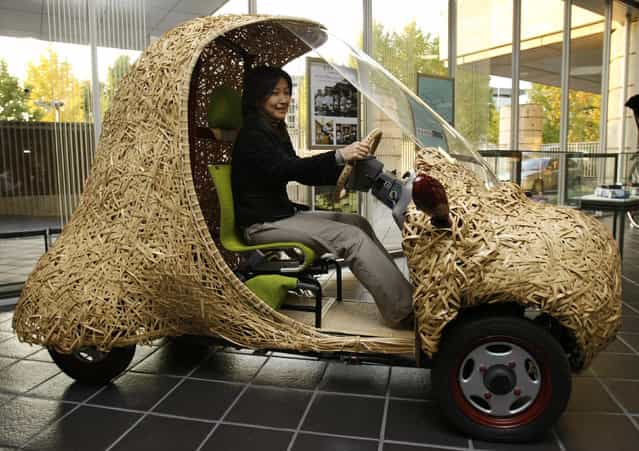 [Bamgoo], an electric car with a body made out of bamboo, is displayed in Kyoto, western Japan November 14, 2008. The sixty-kilogram single-seater ecologically friendly concept car, which measures 270 centimeters in length, 130 centimeters in width and 165 centimeters in height, is developed by Kyoto University Venture Business Laboratory, featuring bamboo articles in the Kyoto area. The car can run for 50 kilometers on a single charge. (Photo by Issei Kato/Reuters)