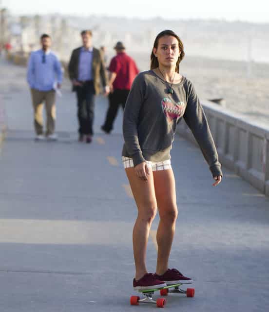 [Skateboarding girl]. (Nathan Rupert)