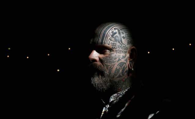 Tattoo artist Matt Black displays tattoos on his head. (Photo by Stefan Wermuth/Reuters)