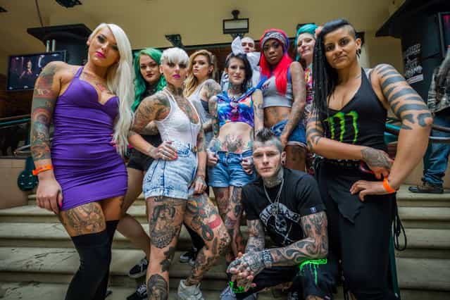 Performers pose for the camera at the 9th London International Tattoo Convention, one of the most prestigious body art conventions in the world. (Photo by Guy Corbishley/Demotix/Corbis)