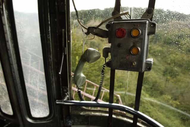A communication device is seen inside a cable car in the town of Chiatura, some 220 km (136 miles) northwest of Tbilisi, September 25, 2013. (Photo by David Mdzinarishvili/Reuters)
