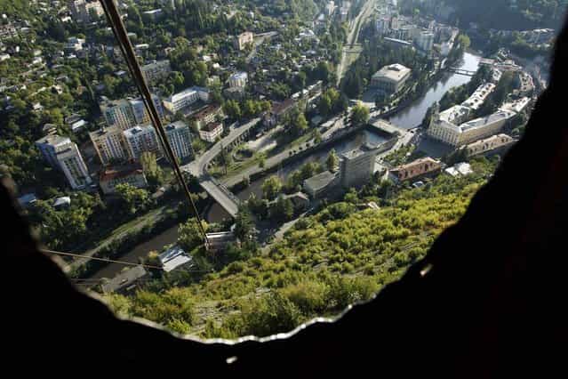 The town of Chiatura is seen from inside a cable car, some 220 km (136 miles) northwest of Tbilisi, September 12, 2013. (Photo by David Mdzinarishvili/Reuters)