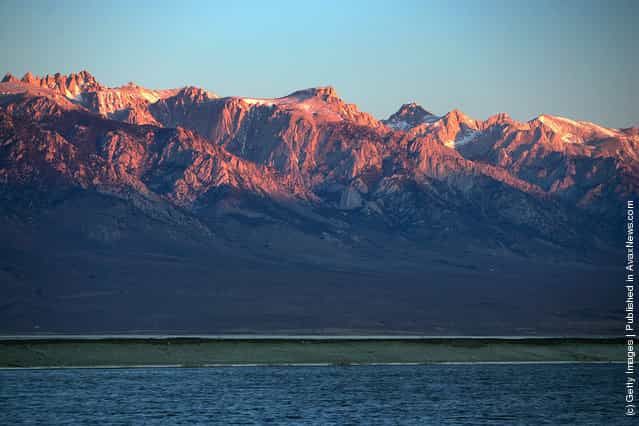 The Sierra Nevada Mountains rise to more than 14,000 feet in elevation behind Owens Lake, fed by the snows of the Sierras which are currently lower than one-fifth its normal depth