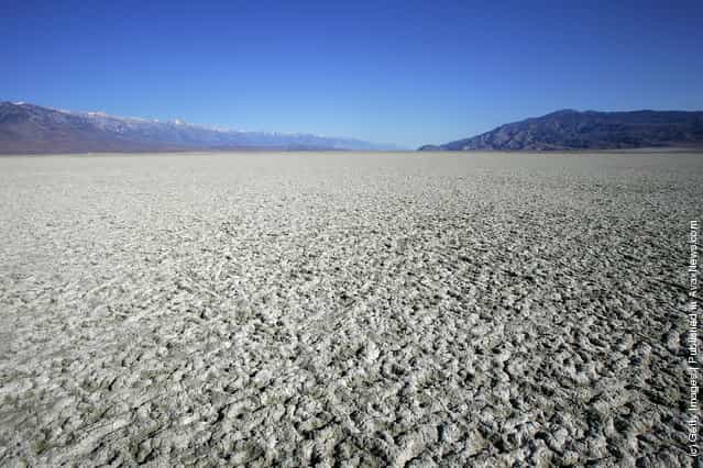 A salty crust of fine dust covers the mostly-dry Owens Lake bed