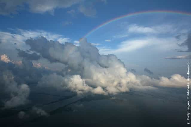 A rainbow appears over the Louisiana gulf May 26, 2010 in the Gulf of Mexico near Brush Island, Louisiana