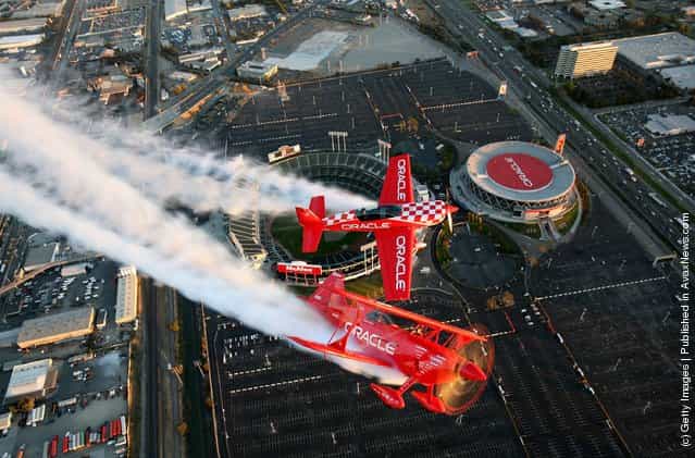 Planes for Team Oracle perform over downtown San Francisco during a practice session for San Francisco Fleet Week