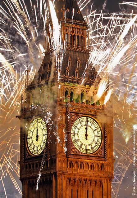 Fireworks light up the London skyline and Big Ben just after midnight on January 1, 2012 in London, England