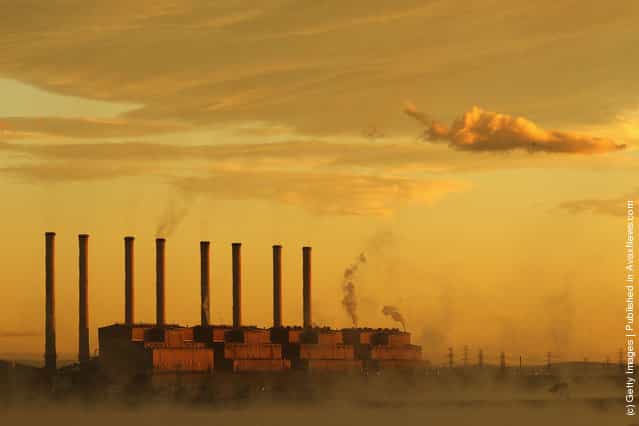 A view of the Hazelwood Power Station across the cooling pondage at sunrise in Melbourne, Australia