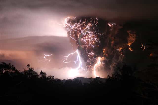Lightning flashes amid a cloud of ash billowing from Puyehue volcano near Osorno, Chile