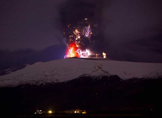 The Iceland volcano Eyjafjallajokull erupt on April 19, sending out a plume of ash and lightning and offering a rare glimpse at the mysterious electrical phenomenon known as a [dirty thunderstorm]