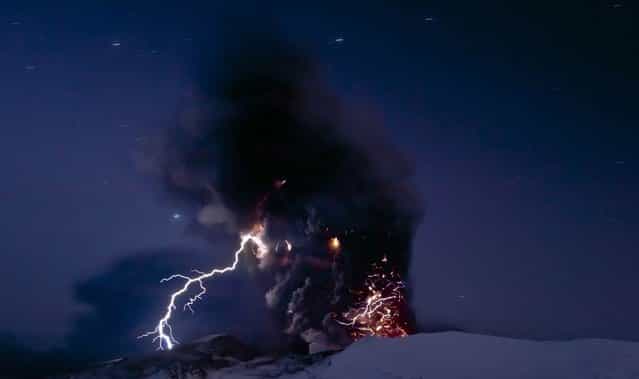The Iceland volcano Eyjafjallajokull erupt on April 19, sending out a plume of ash and lightning and offering a rare glimpse at the mysterious electrical phenomenon known as a dirty thunderstorm