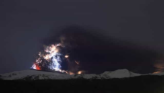 The Iceland volcano Eyjafjallajokull erupt on April 19, sending out a plume of ash and lightning and offering a rare glimpse at the mysterious electrical phenomenon known as a dirty thunderstorm
