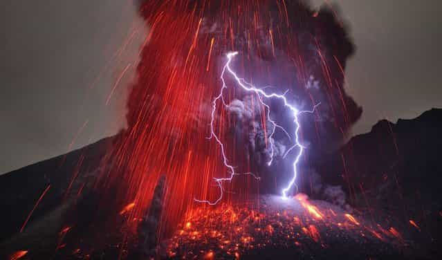 Lightning only ever strikes a volcanic eruption during heavy [vulcanian] or [plinian] explosions when the amount of red lava is very low. (Photo by Martin Rietze/Guzelian)