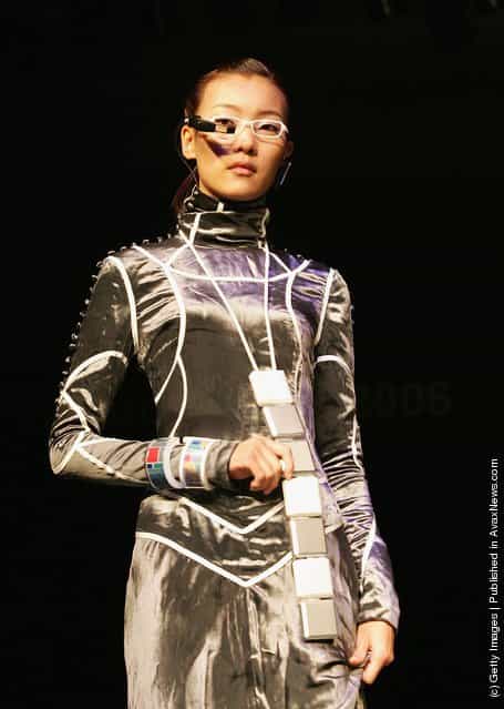 South Korean models, with wearable computers, walk the cat walk during the Ubiquitous Fashionable Computer Fashion Show