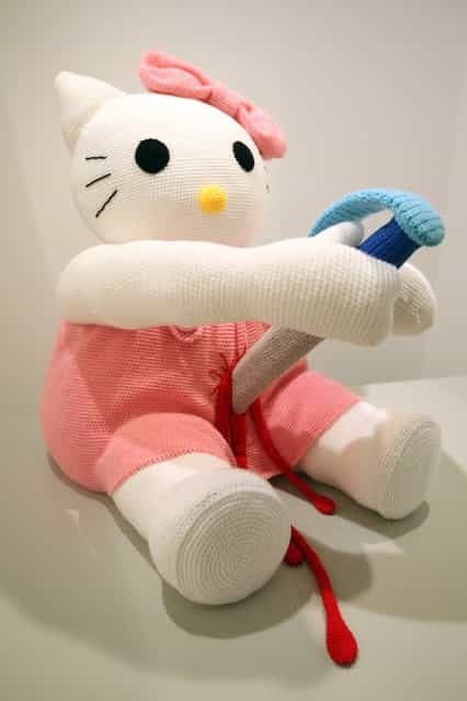 The knitted sculpture Hello Kitty by Patricia Waller, featuring the cartoon character as a harakiri ritual suicide victim, sits in the Broken Heroes exhibition at the Deschler Gallery