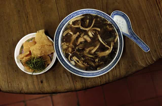 Snake meat is seen in a bowl of snake soup served at a snake soup shop in Hong Kong January 30, 2013. (Photo by Bobby Yip/Reuters)