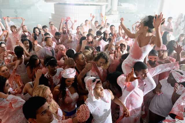 150 people, an empty swimming pool and loads of fake blood and guts, on October 18, 2013 in Dagenham, England. (Photo by Dave J. Hogan/Stringer) 150 people, an empty swimming pool and loads of fake blood and guts, on October 18, 2013 in Dagenham, England. (Photo by Dave J. Hogan/Stringer)