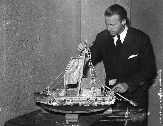 Thor Heyerdahl with a model of the balsa raft Kon Tiki