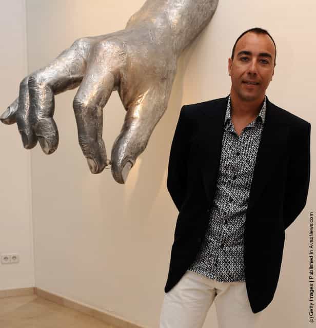Artist Lorenzo Quinn attends the opening of an exhibit of his sculptures at Gabriel Vanrell Gallery