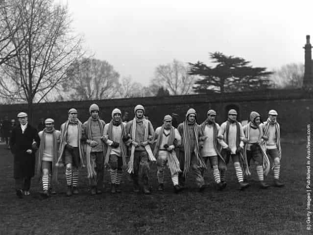 The Collegers team enter the field for the 87th Wall Game against the Oppidans on St Andrews Day at Eton College, 30th November 1927