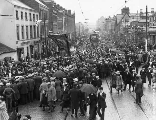 1920: Members of the Protestant Orange Order march through Shaftesbury Square in Belfast