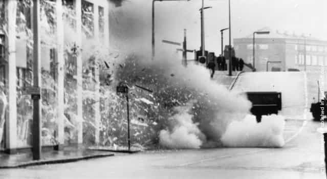 1971: A car explodes after troops carried out a controlled explosion of a suspected bomb in Belfast