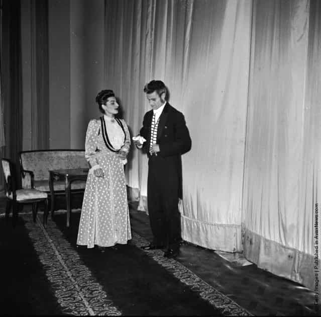 1950: Two actors from a production of Oscar Wildes play, Lady Windemeres Fan talk back-stage at the Theatre Saadi in Tehran