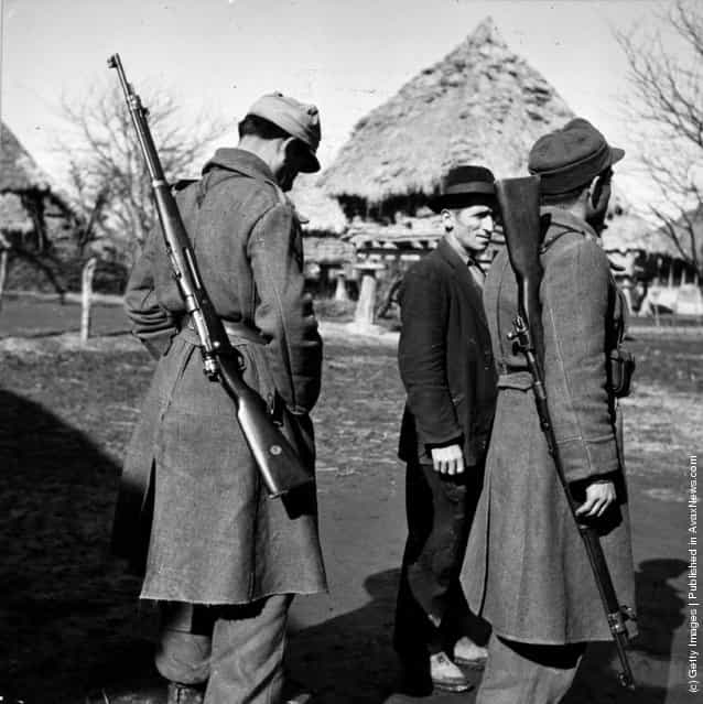 1952: A deserter from the army being escorted by two members of the military police. Desertions are frequent in Iran where the population is not accustomed to organised militarism