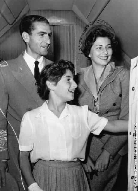 1953: Mohammed Reza Pahlavi, Shah of Iran, with his wife Soraya, Queen of Persia and daughter Princess Shahnaz at the airport at Tehran, bound for Switzerland. The Shah left Persia for an indefinite period during which a Regency Council governed the country