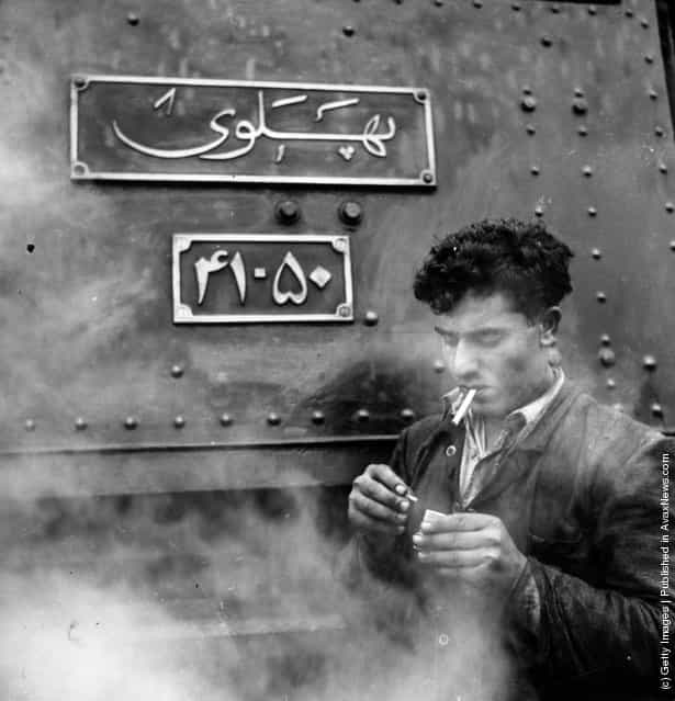 1955: A railway engineer resting for a cigarette at Zagheh in the Luristan mountains of West Central Persia