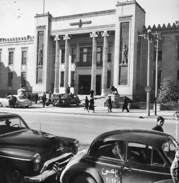 1955: The Melli bank which is the centre of foreign commerce in Teheran, Persia. The architecture is modern though the relief figures on the front are of ancient Persians