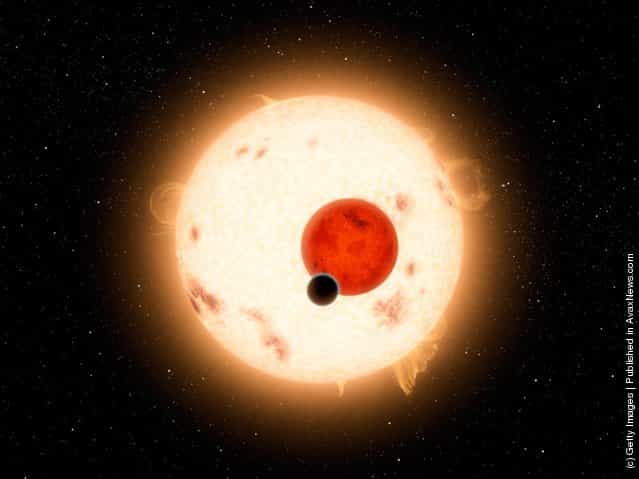 The newly-discovered gaseous planet Kepler-16b orbits its two stars