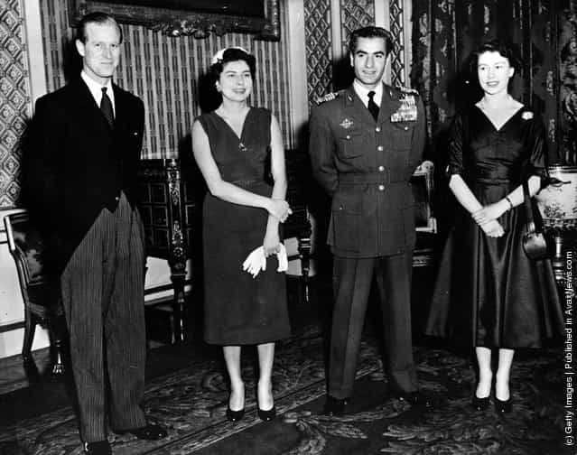 19th February 1955: Royal guests at Buckingham Palace. From left to right, HRH the Duke of Edinburgh, Queen Soraya of Persia, The Shah of Persia and HM The Queen