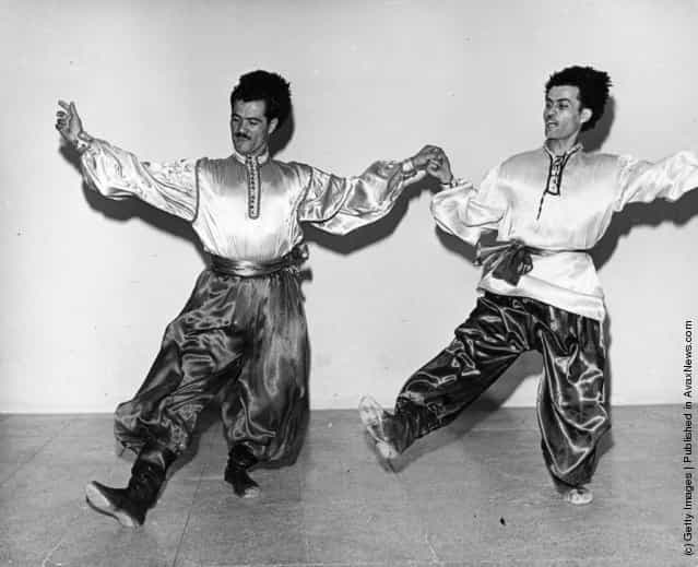 1961: Two traditional folk dancers performing in Teheran, Iran