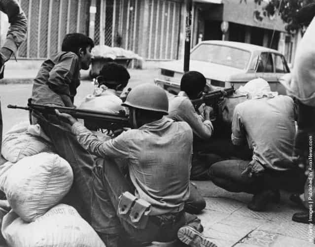 A gun battle in Khorramshahr, in southwestern Iran, during the Iranian Revolution, 1979