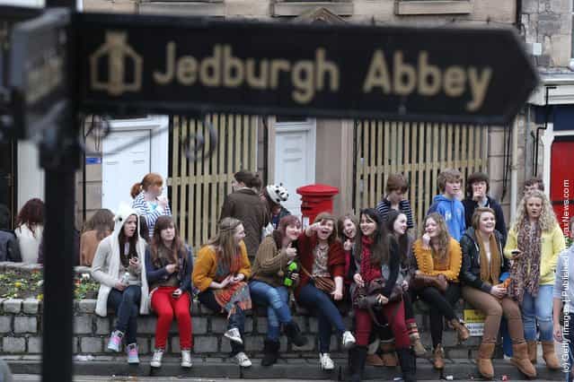 Girls gather to watch the annual Fastern Eve Handba event in Jedburghs High Street in the Scottish Borderson March