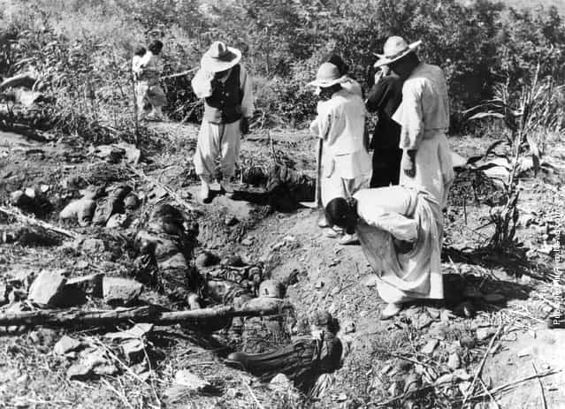 The scene after North Korean police massacred 300 South Korean civilians at Changa-Pa, 1950