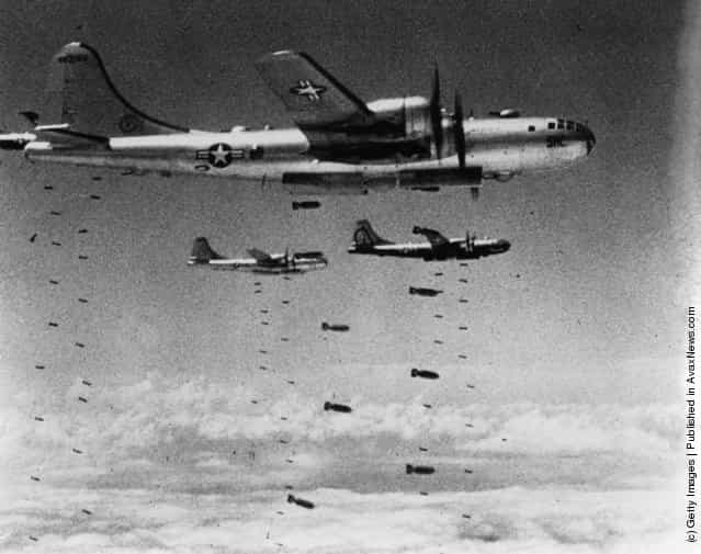 US Air Force B-29 Superfortresses dropping bombs on a strategic target during the Korean War, 1951