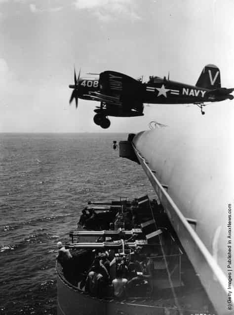A United States navy Chance Vought F4U Corsair as it leaves the deck of a United States Navy aircraft carrier, operating off the coast of Korea, for a sortie against the Communist-led North Korean forces, 1952