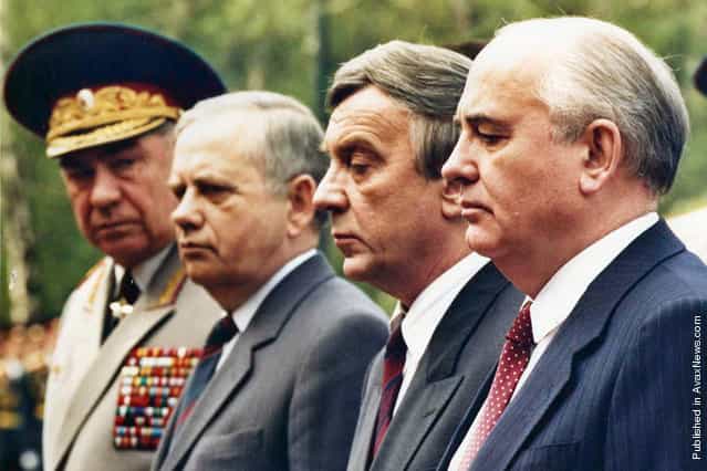 A few weeks before the Coup, Mikhail Gorbachev stands surrounded by his so-called friends, all of them soon to be leaders of the August Coup against him. Vice President Gennady Yanayev, second from right, became the most visible of the Coup leaders. Here, they are lighting the flame at the tomb of the unknown soldier outside the Kremlin wall in May of 1991